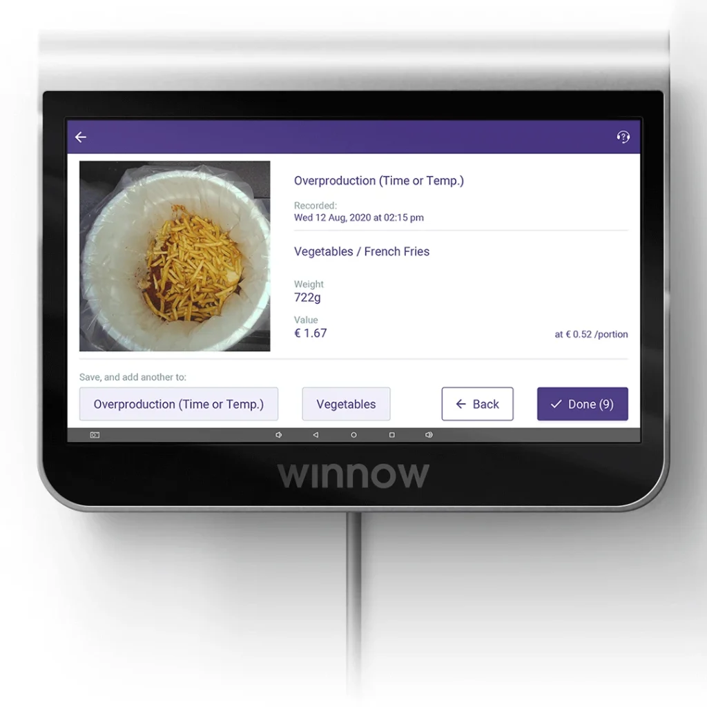 Winnow AI tablet displaying the weight and value of discarded french fries to help commercial kitchens reduce food waste