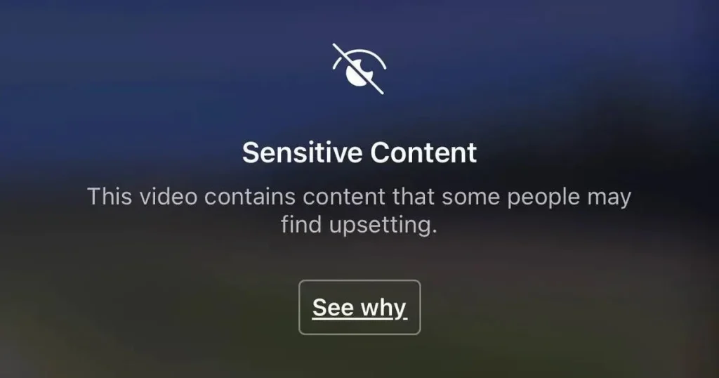 A "Sensitive Content" warning screen, an example of AI-powered content moderation classifying potentially upsetting video content